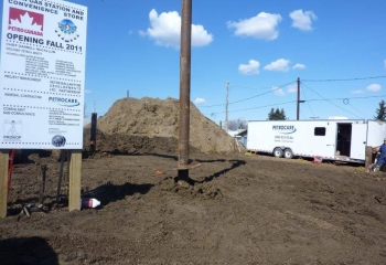 Screw piles being installed